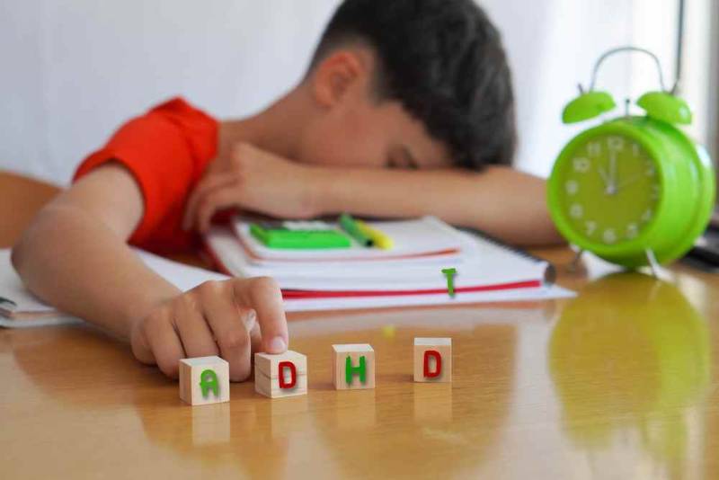 ADHD symptoms illustrated in a distracted and restless child